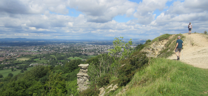 Fantastic views of the Severn Valley from Leckhampton Hill on the Cotswold edge, Devil's Chimney in the foreground.