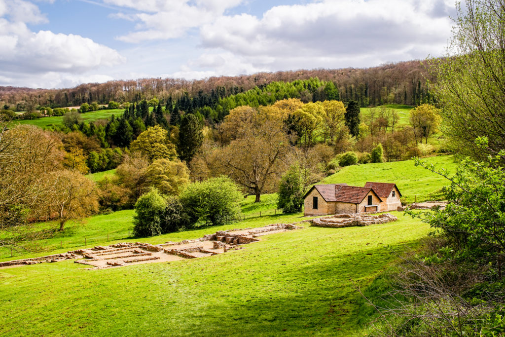 The Roman Villa at Great Witcombe is located on a gentle valley slope below the Cotswold edge.